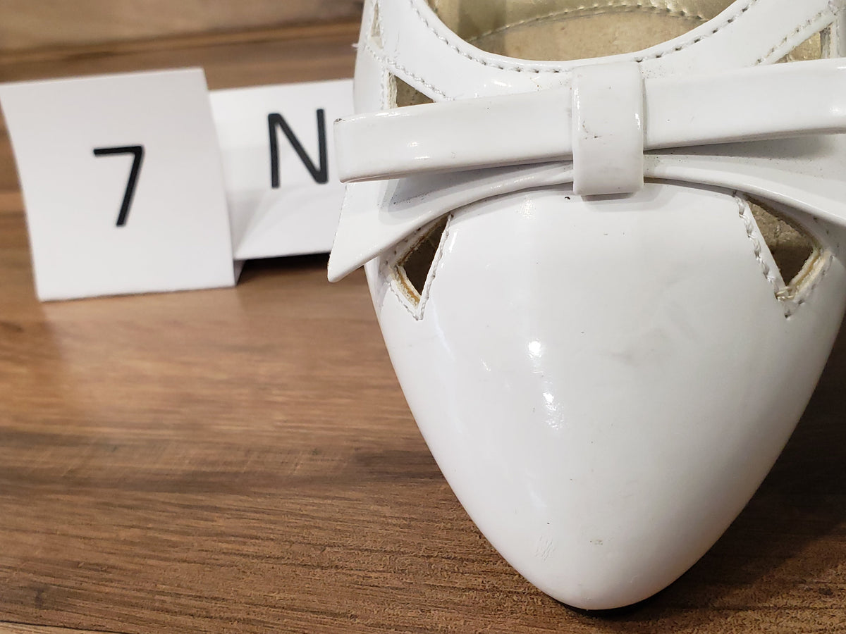 Allen's Bootery Soft Style by Hush Puppies Deni white patent leather slingback flat with a decorative bow detail