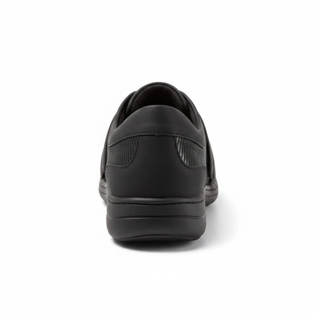 Allen's Bootery Joy black sporty walking shoe, back view showing the cushioned heel and flexible rubberized sole.