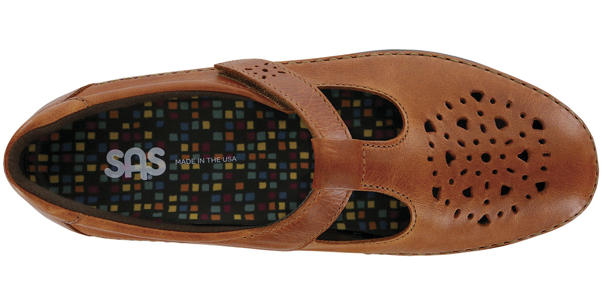 Allen's Bootery Willow chestnut leather moccasin with cutout pattern, adjustable strap, and cushioned footbed.