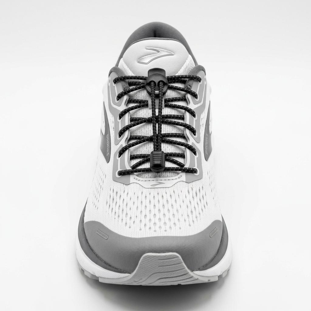 Allen's Bootery 10 Seconds Elastic-Laces installed on a white and grey running shoe with a black locking mechanism.