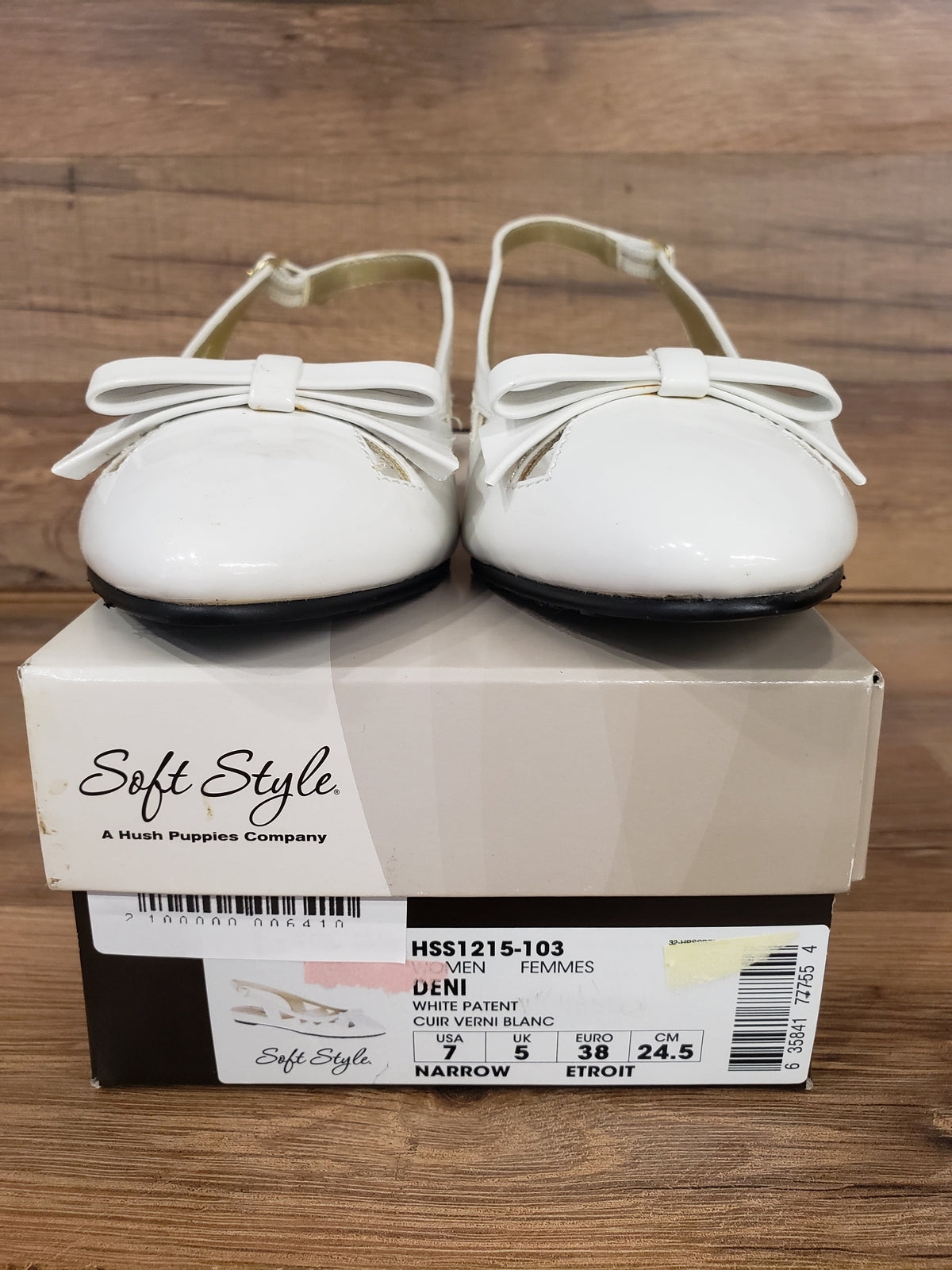 Allen's Bootery Soft Style by Hush Puppies Deni white patent leather slingback flats with bow detail on shoe box