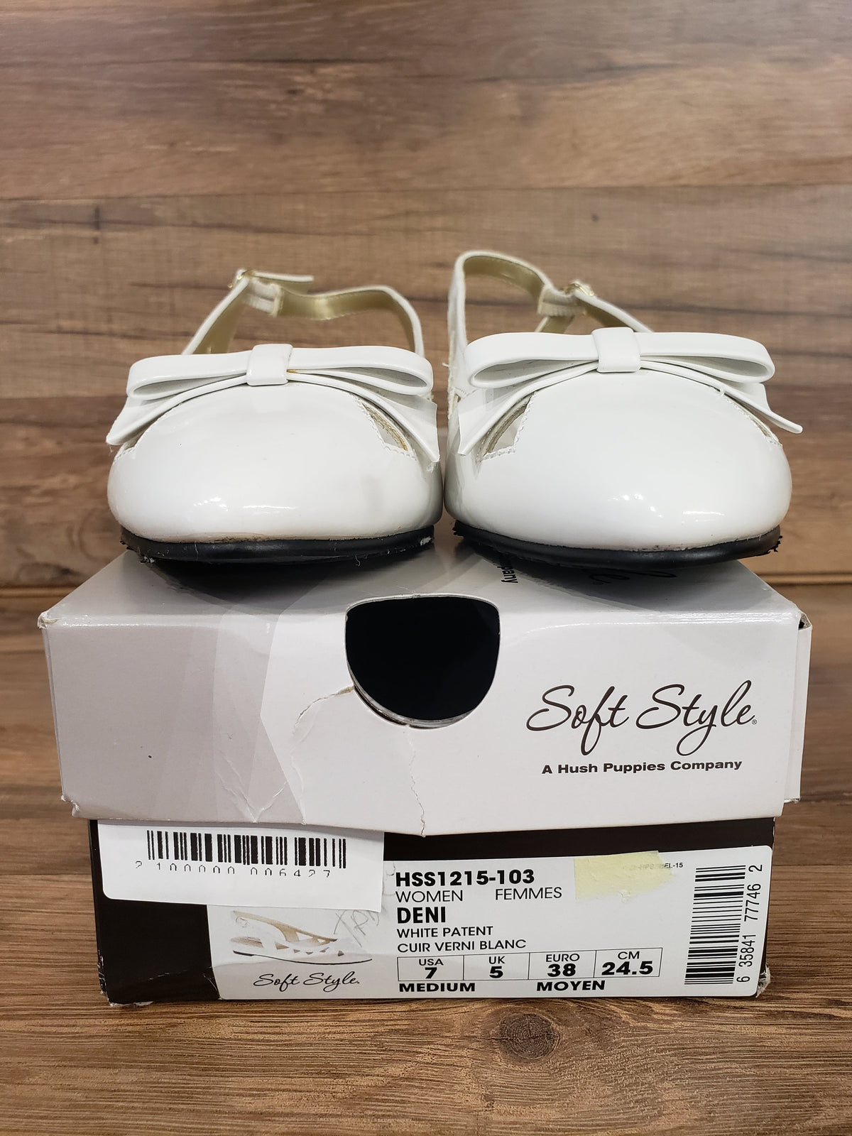 Allen's Bootery Soft Style by Hush Puppies Deni white patent leather slingback flats with bow detail on shoe box