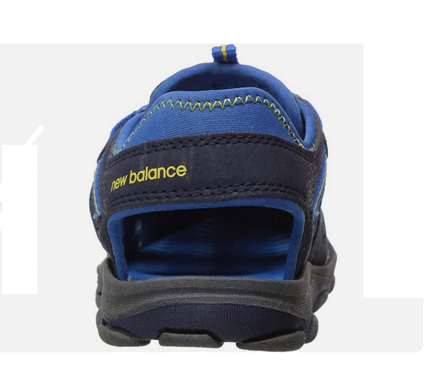 Allen's Bootery Big Kid's Adirondack closed-toe sandal in navy and blue with yellow stitching and heel pull tab