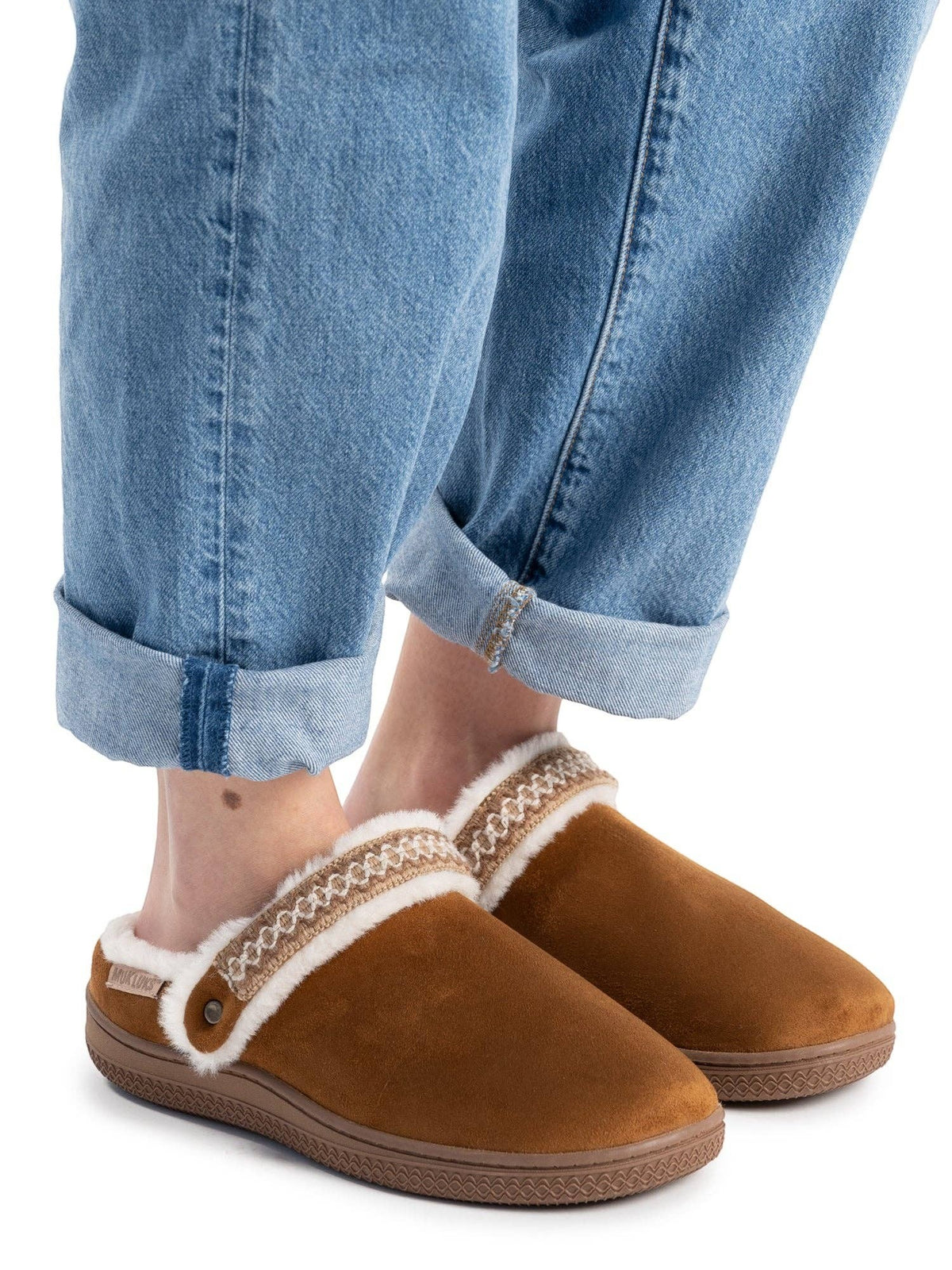 Allen's Bootery MUK LUKS chestnut brown convertible clog slippers with white faux fur trim worn with cuffed blue jeans