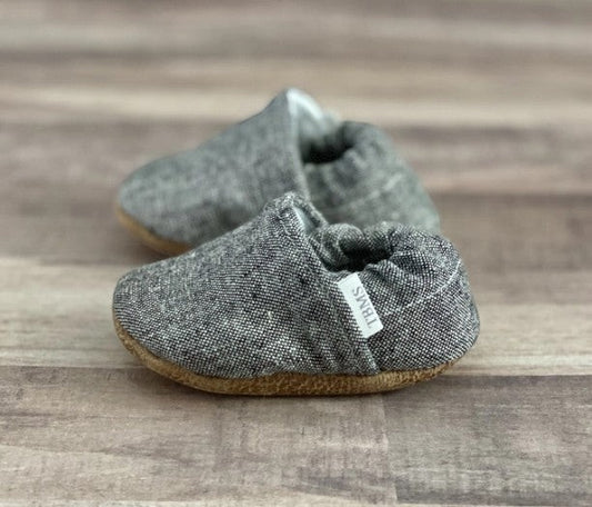 Allen's Bootery grey textured fabric infant crib shoes with soft flexible soles and elasticized ankle openings.