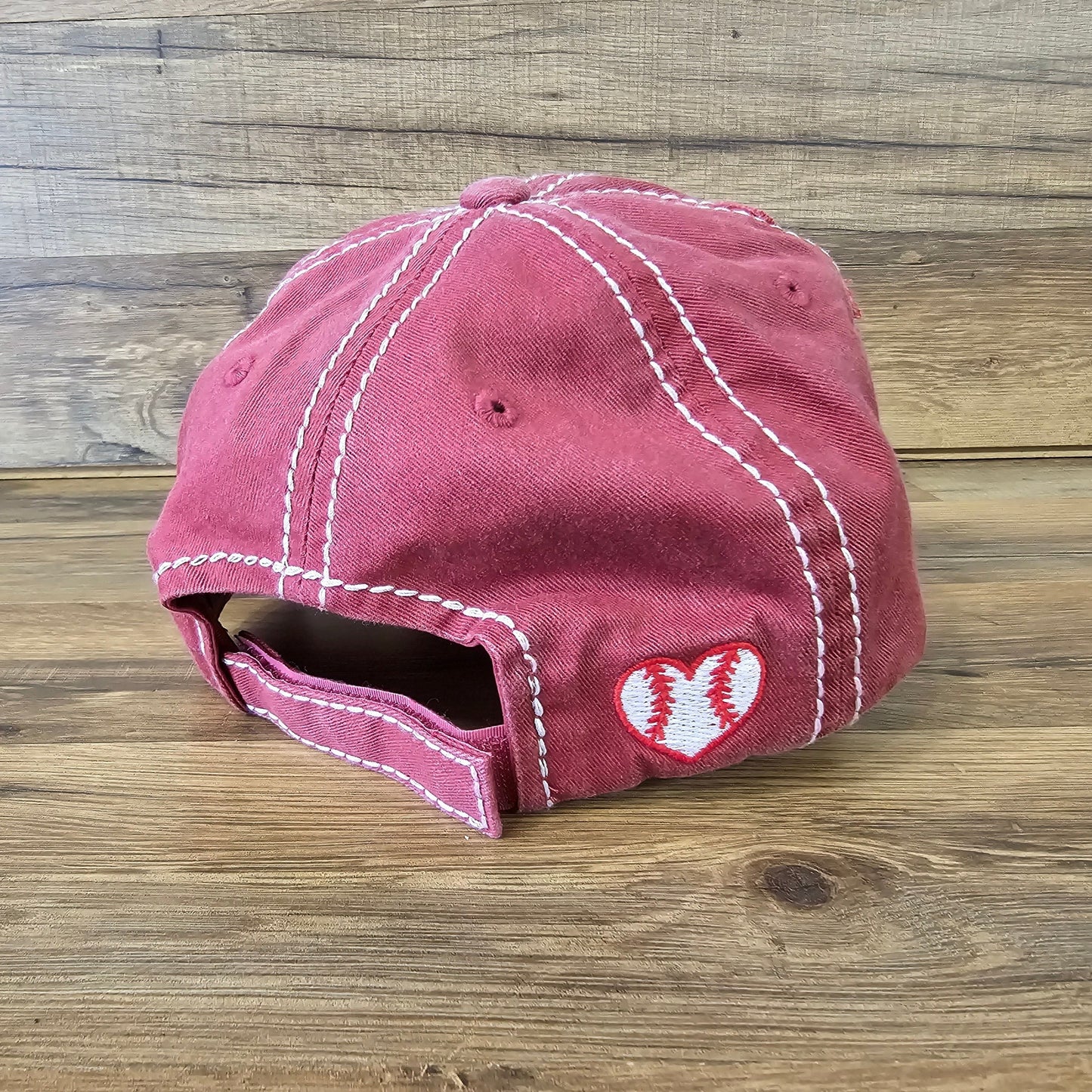 Allen's Bootery maroon baseball mom hat with white contrast stitching and a heart-shaped baseball embroidery detail.