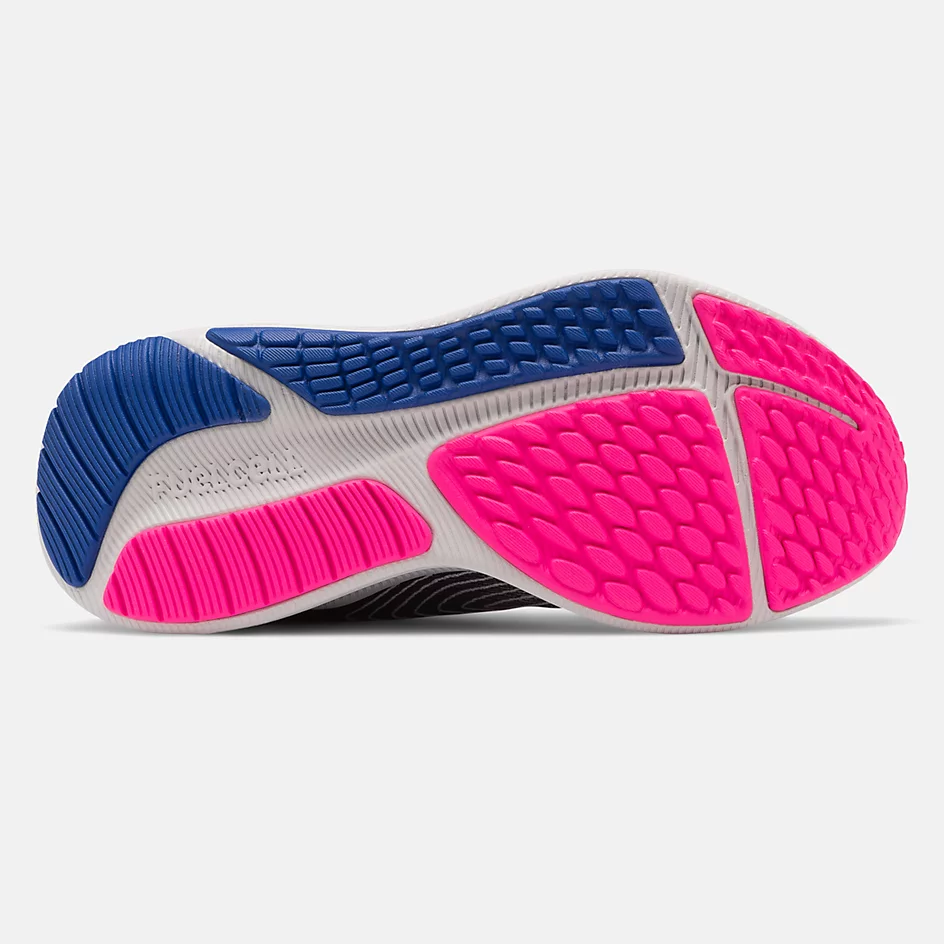 Allen's Bootery New Balance FuelCell Propel running shoe sole in vibrant pink and blue with textured grip pattern
