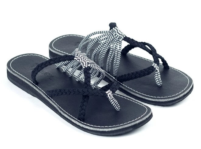 Allen's Bootery Oceanside hand-woven rope flip-flops in black and white zebra pattern with a durable rubber sole.