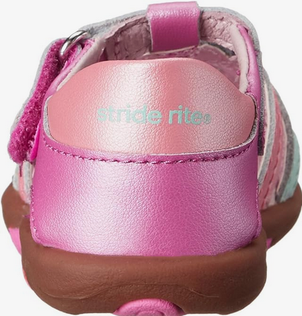 Allen's Bootery Stride Rite infant sandal in metallic pink and white with a supportive brown rubber sole
