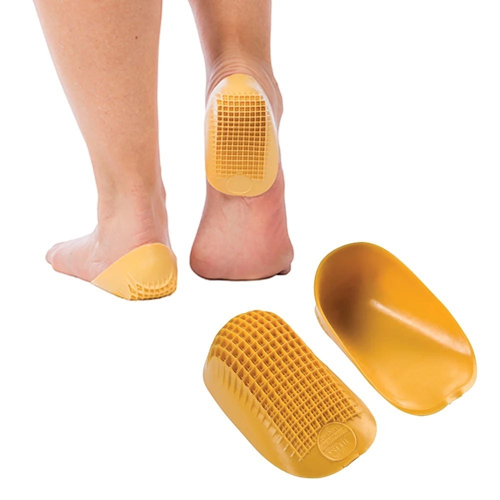 Allen's Bootery Tuli's yellow shock-absorbing heel cups for pain relief and cushioning in shoes