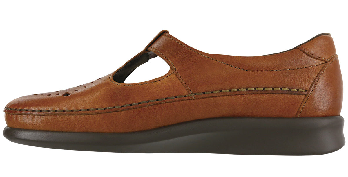 Allen's Bootery Willow chestnut leather moccasin with cutout pattern, adjustable strap, and cushioned sole.