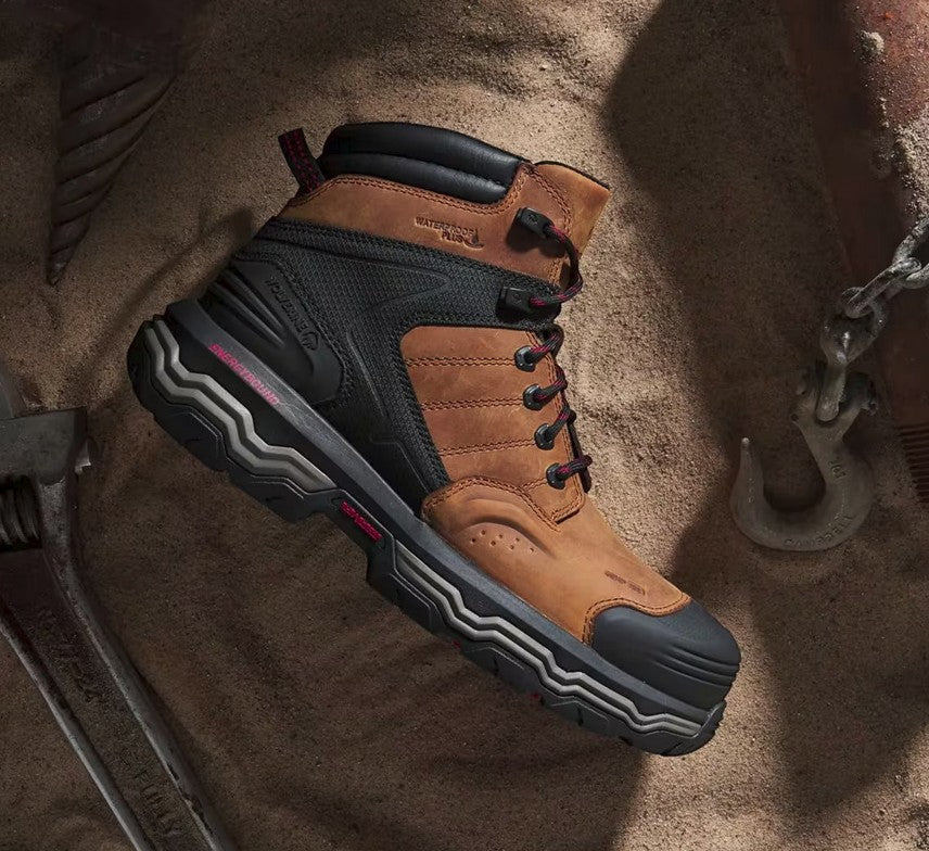 Allen's Bootery Wolverine Alpha 6-inch waterproof work boot in dark tan leather with black protective toe and heel caps.
