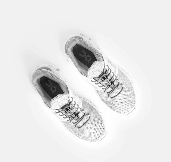 Allen's Bootery Xpand quick release steel elastic laces installed on white athletic sneakers for a secure fit