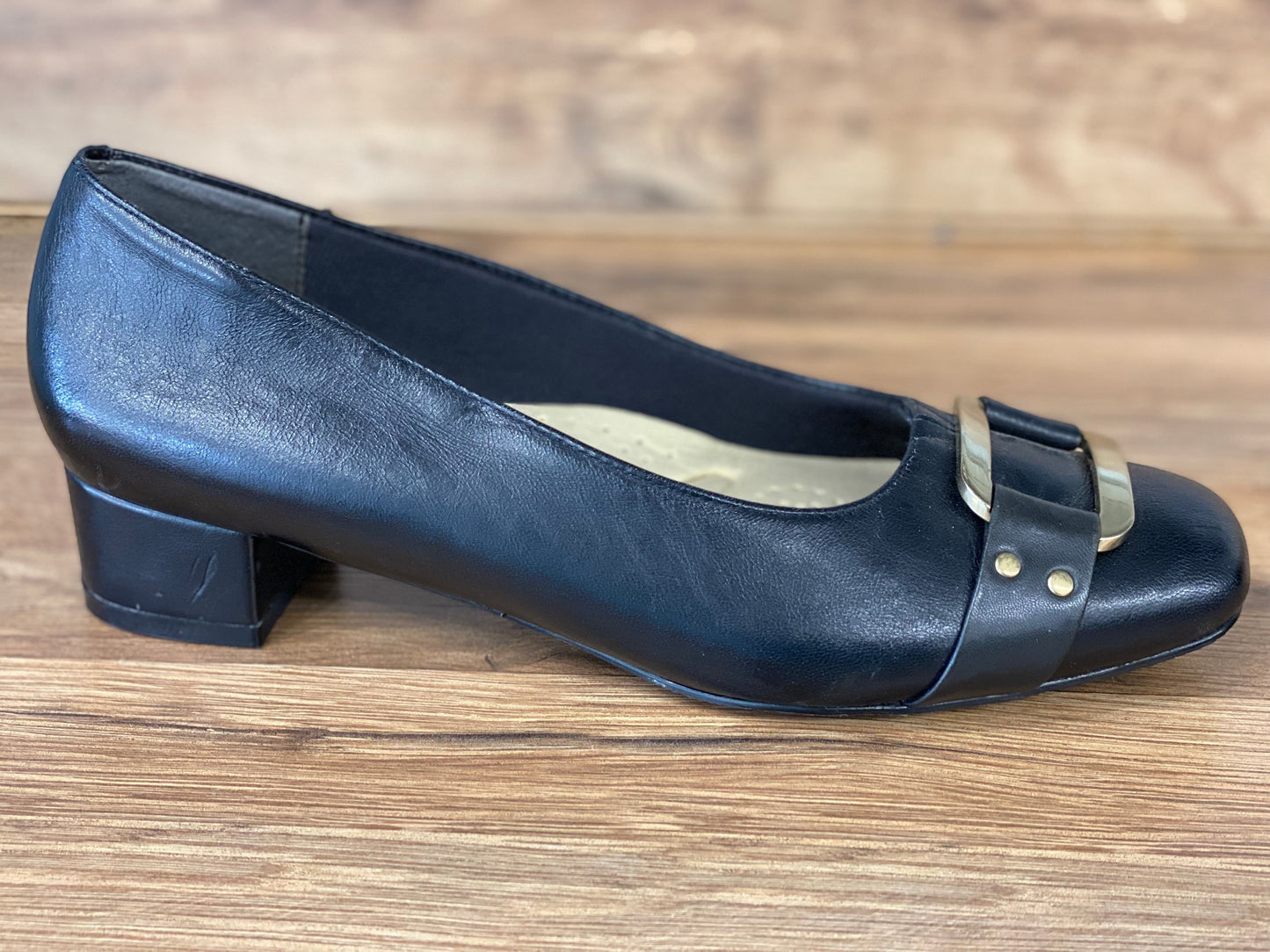 Allen's Bootery Trotters Doris black leather dress shoe with gold buckle and low block heel