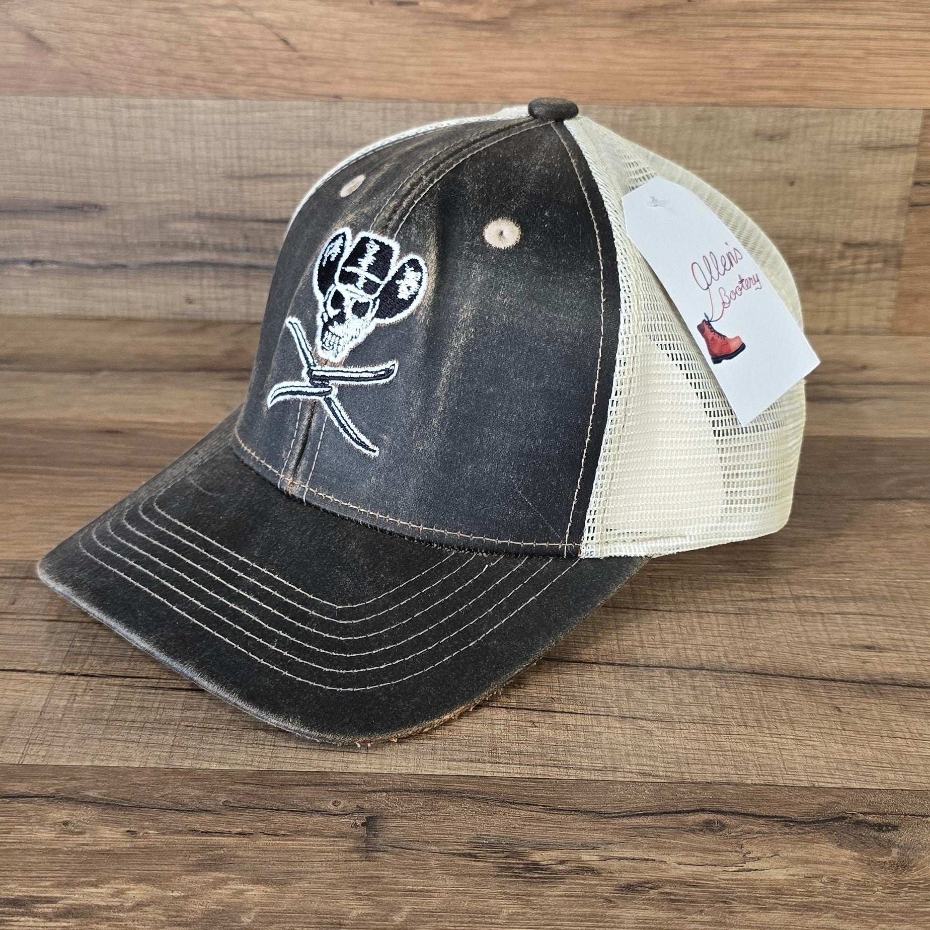 Allen's Bootery brown distressed Twisted X mesh hat with a skull and cowboy hat embroidered logo