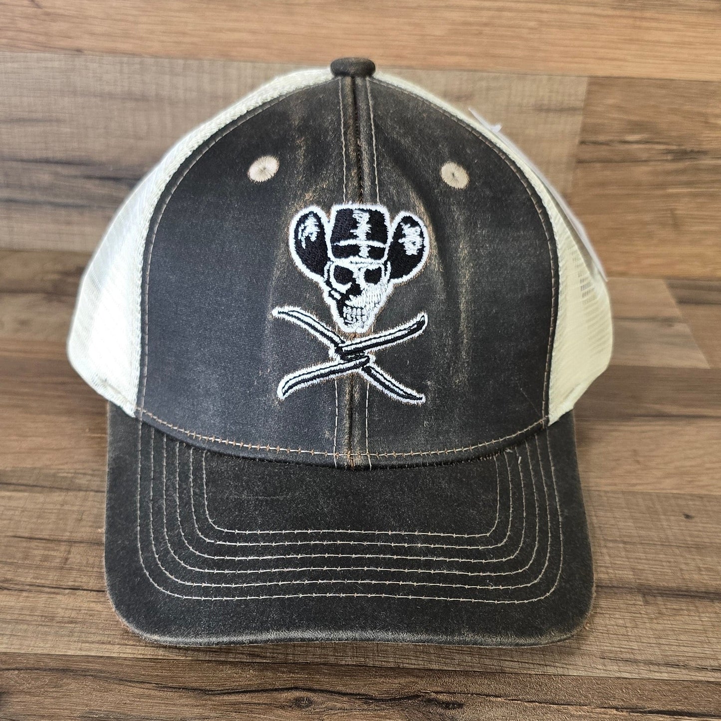 Allen's Bootery brown distressed mesh hat featuring a white embroidered skull and cowboy hat logo on the front.