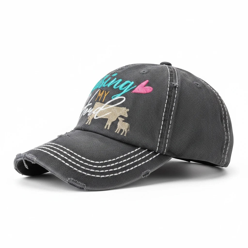 Allen's Bootery charcoal distressed baseball cap with Raising My Heard embroidery and cow graphic