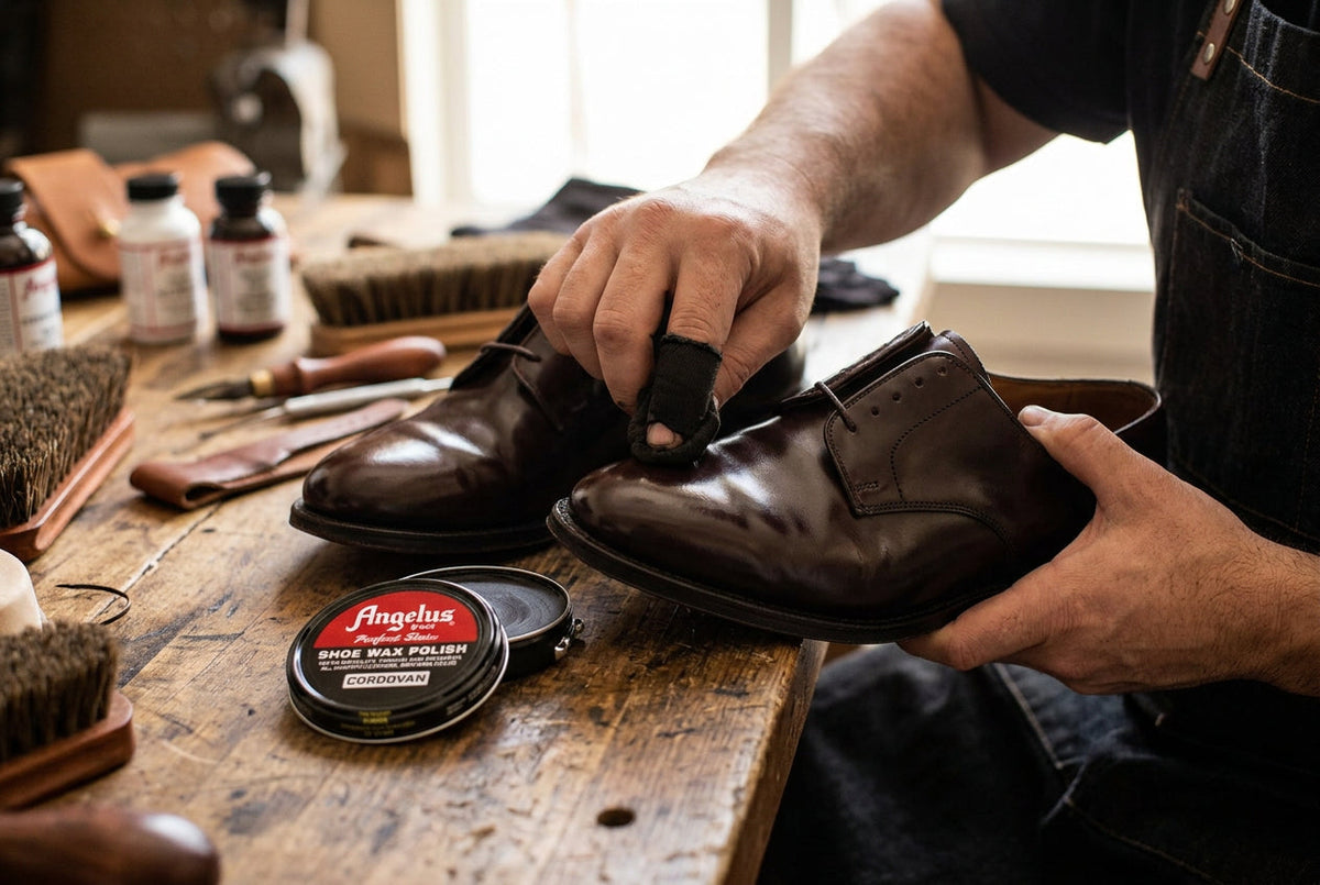 Allen's Bootery professional applying Angelus Cordovan Shoe Wax Polish to a dark brown leather dress shoe