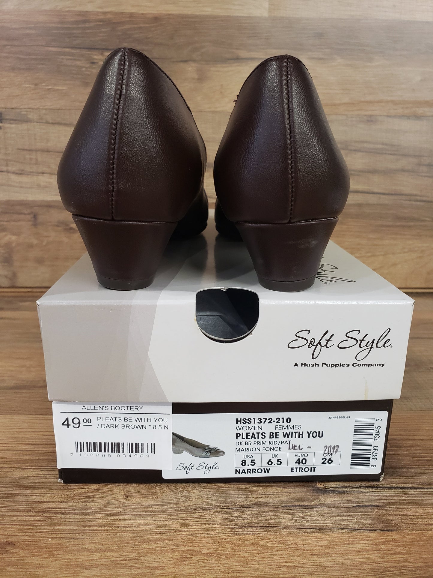Allen's Bootery dark brown Pleats Be With You pumps resting on their original Soft Style shoe box
