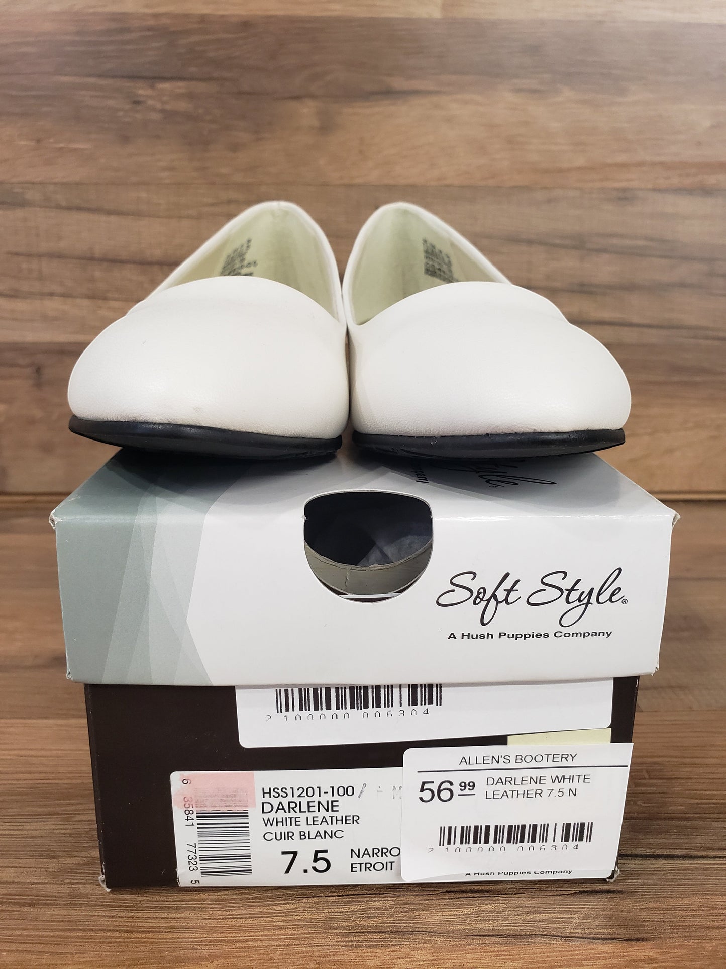 Allen's Bootery Darlene white leather flat shoes with synthetic soles resting on their original Soft Style box.