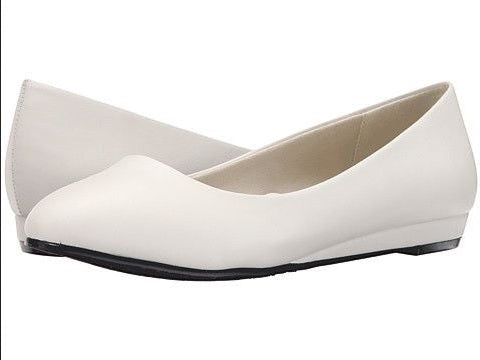 Allen's Bootery Darlene white leather ballet flats with a low heel and synthetic sole.