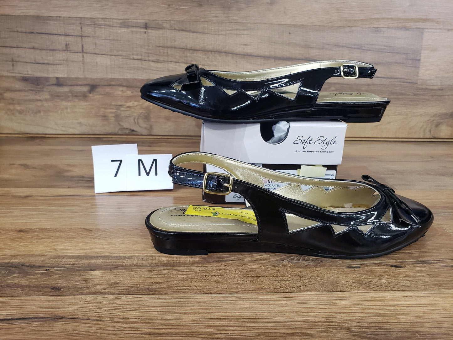 Allen's Bootery Deni black patent slingback flat dress shoes with a side buckle closure and cutout detailing.