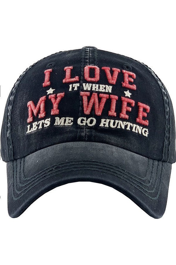 Allen's Bootery black distressed baseball cap with red and white embroidered I Love My Wife Lets Me Go Hunting text.