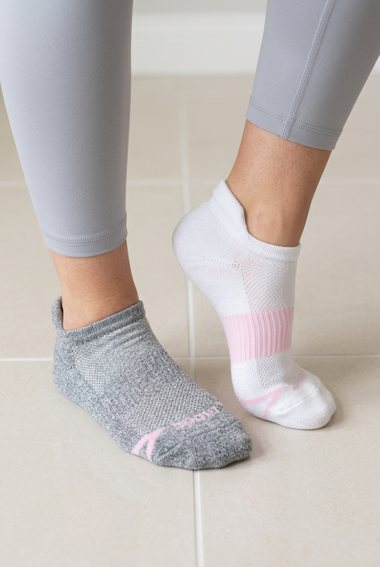 Allen's Bootery Ghost 2-pack athletic socks in grey and white with pink accents, featuring arch support and heel tabs.