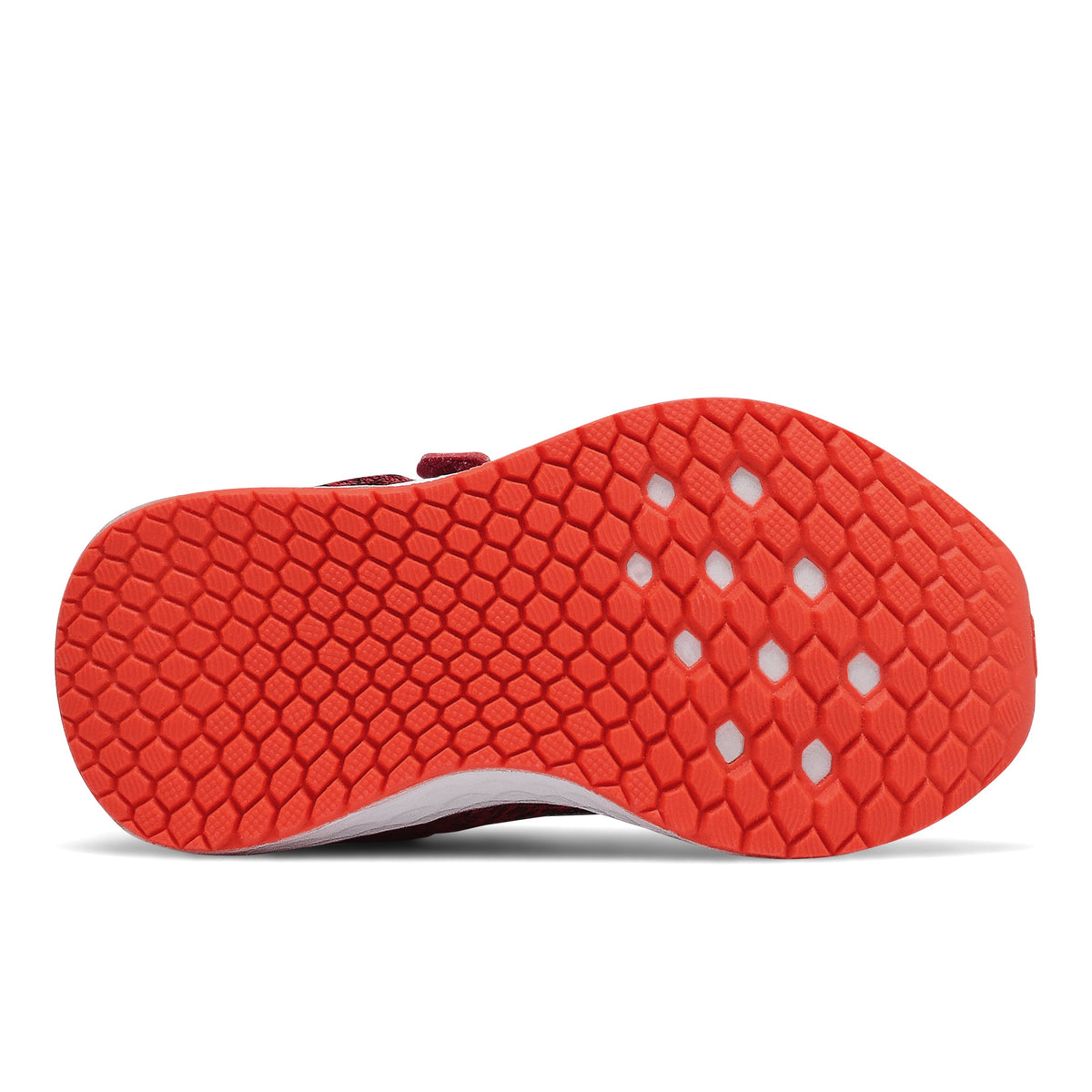 Allen's Bootery infant New Balance sneaker showing the red rubber outsole with Fresh Foam hexagonal tread pattern