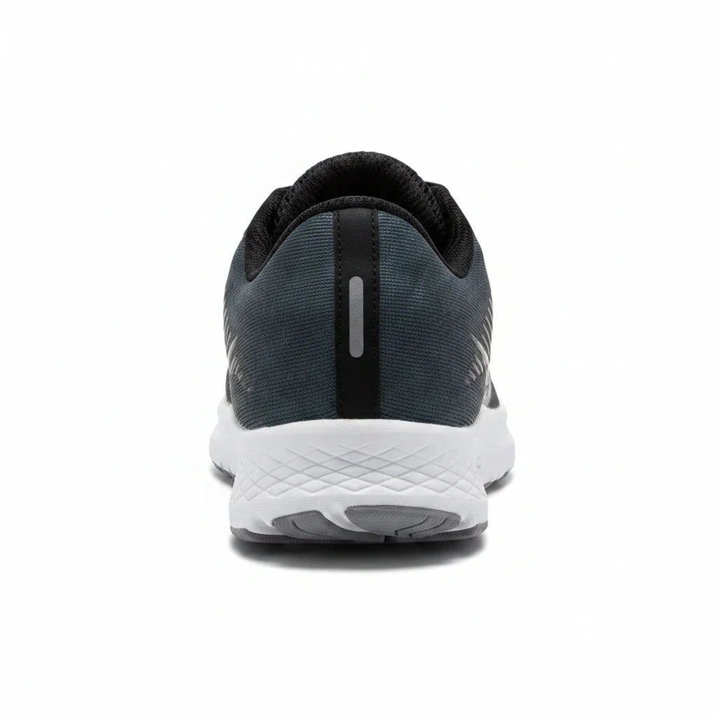 Allen's Bootery Big Kid's Guide 16 running shoe in black and white, showing the rear view with a reflective heel tab.