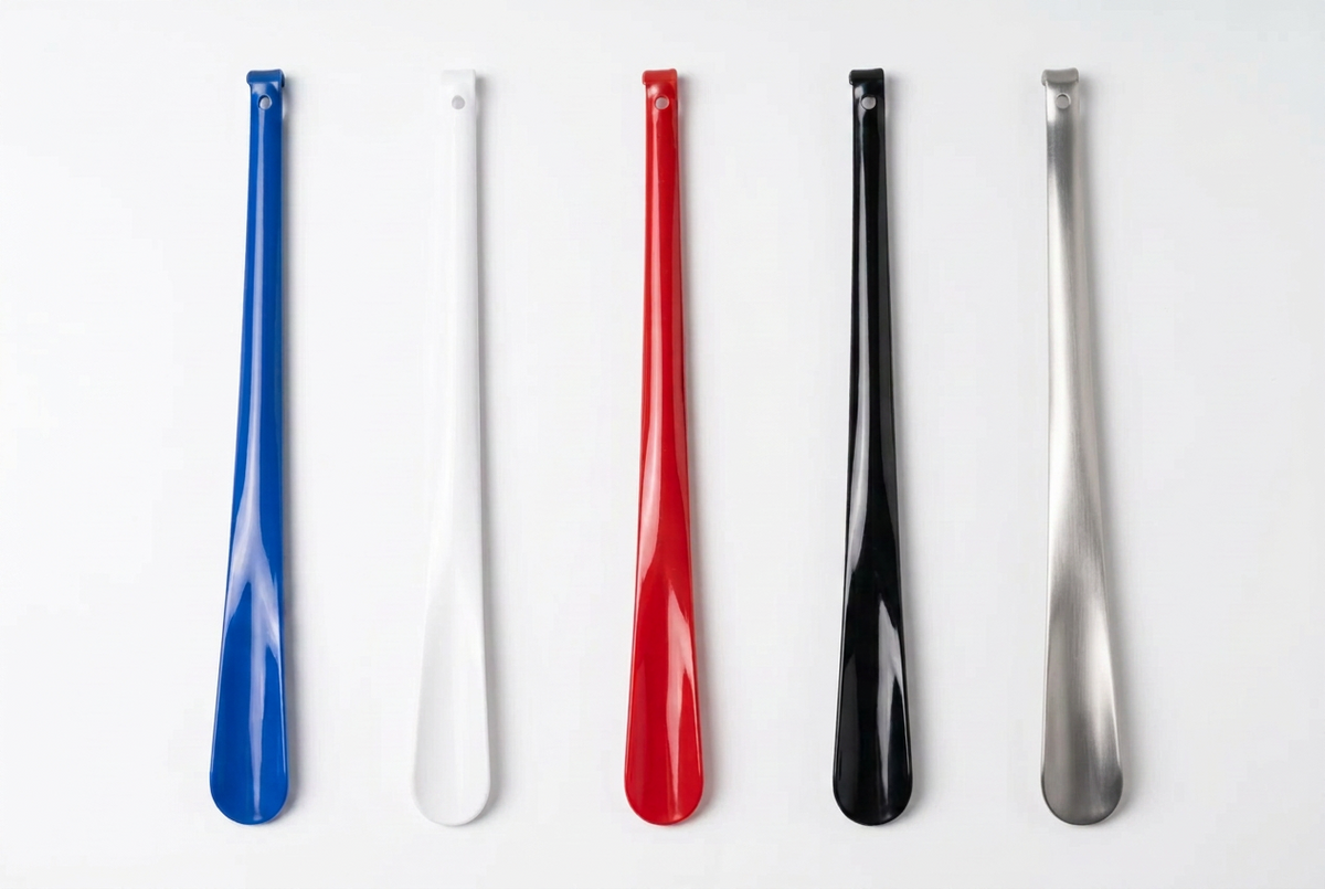 Allen's Bootery 23-inch metal shoe horns in blue, white, red, black, and silver finishes for easy shoe access.