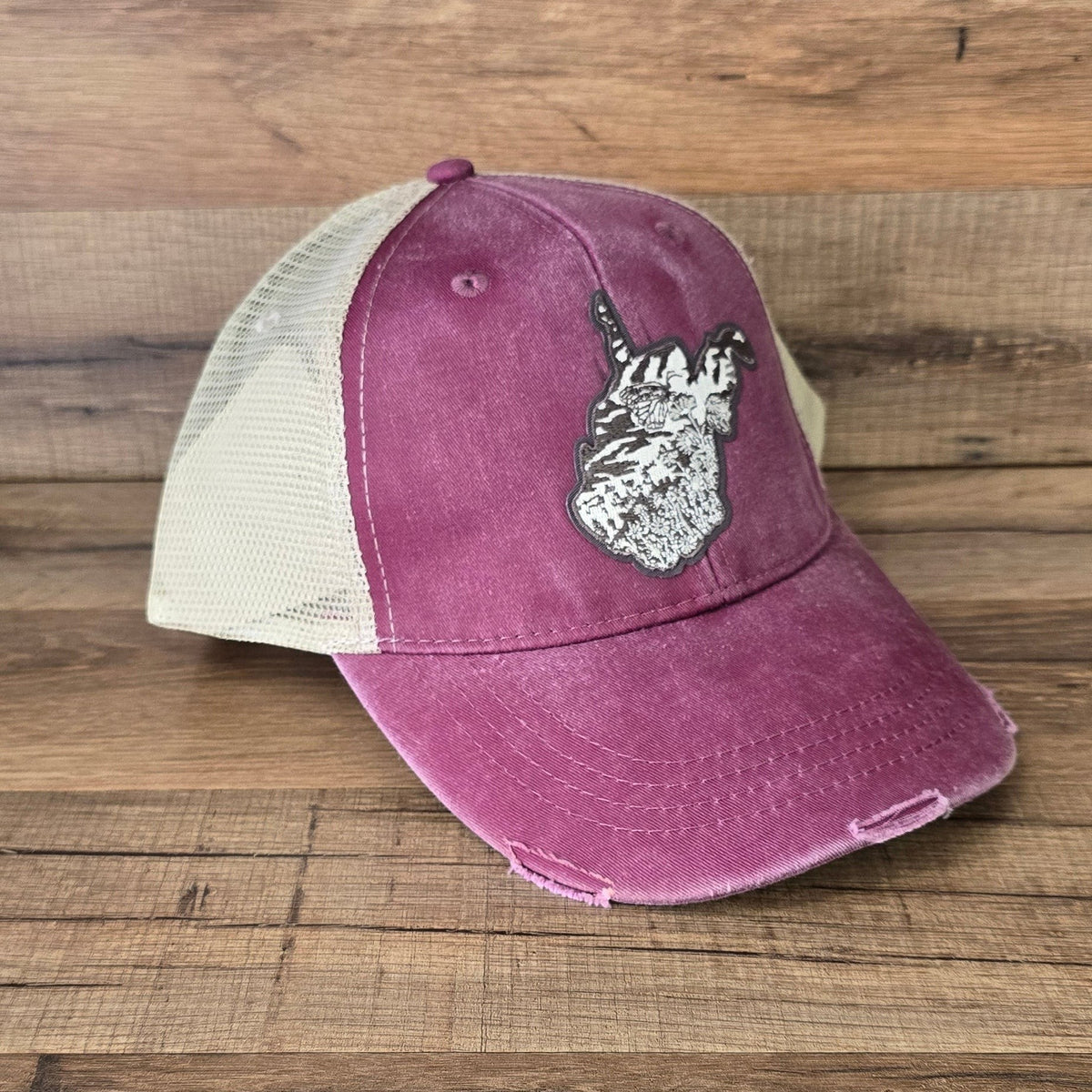 Allen's Bootery distressed maroon trucker hat with a white mesh back and a monarch butterfly patch on the front.