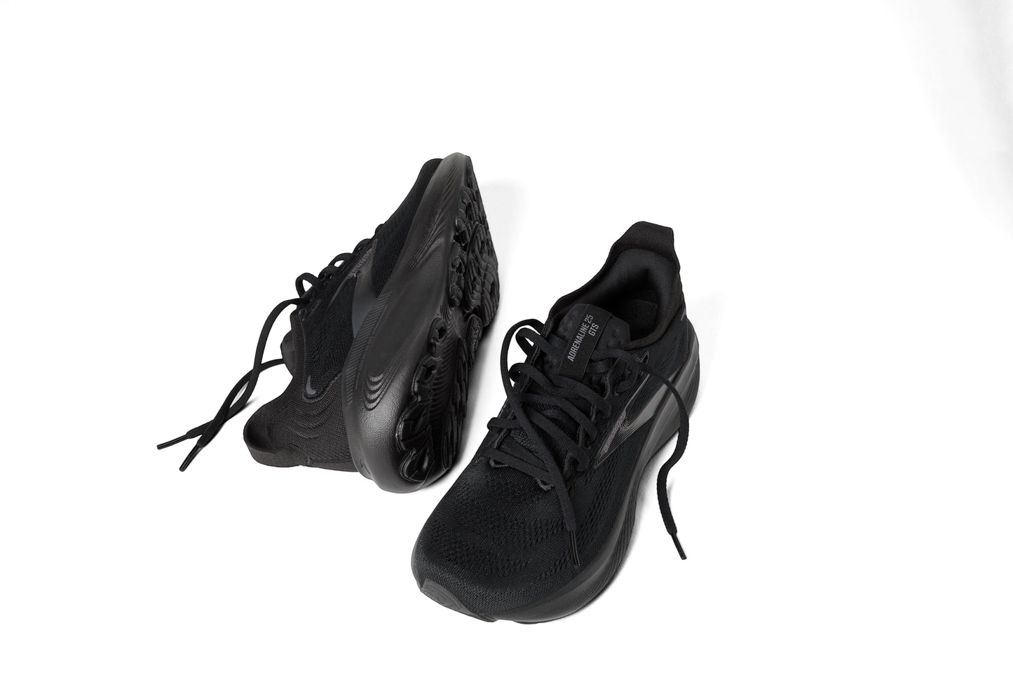 Allen's Bootery Men's Adrenaline 25 running shoes in black. Engineered for support and cushioning.