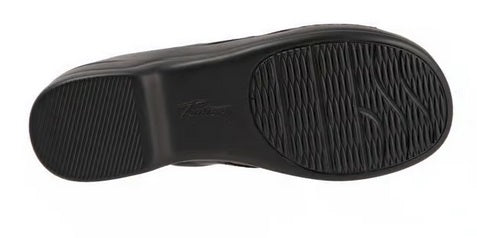 Allen's Bootery Nara black sandal showing the textured, flexible lightweight polyurethane sole from a bottom view.