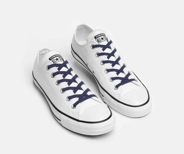 Allen's Bootery Xpand Laces Original navy blue elastic no-tie laces installed on white low-top sneakers