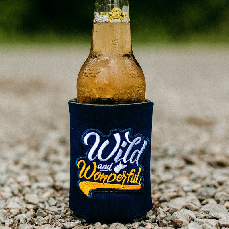 Allen's Bootery navy blue can cooler featuring a Wild & Wonderful embroidered patch holding a glass beer bottle.