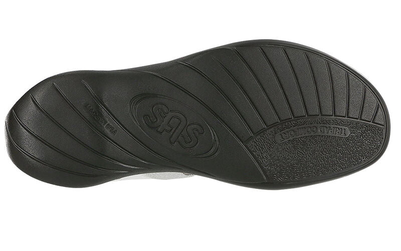 Allen's Bootery Nudu white sandal showing the black textured rubber outsole with Tripad Comfort branding