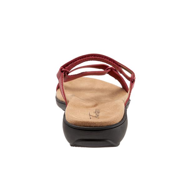 Allen's Bootery Raja red leather sandal featuring slim asymmetric straps, a comfortable footbed, and a flexible sole.