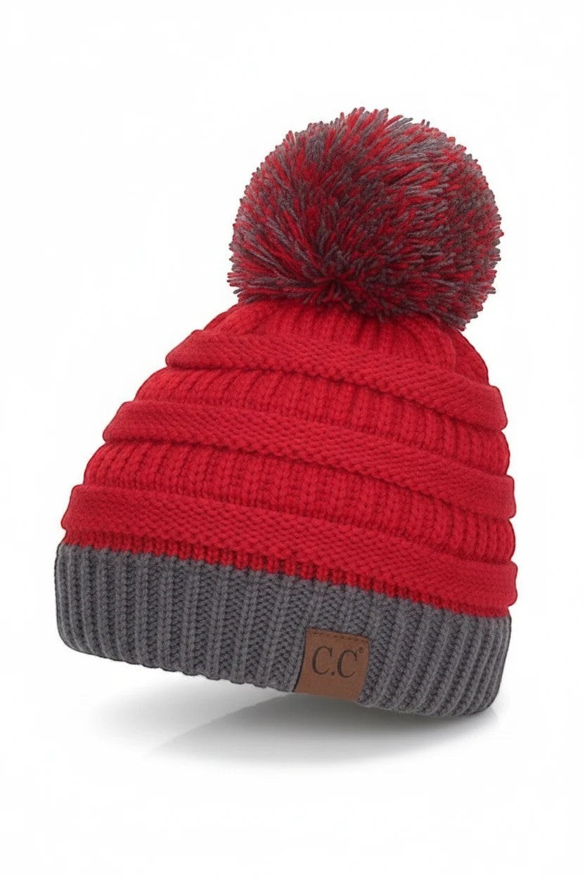 Allen's Bootery red and grey ribbed knit beanie with a matching pom-pom and brown logo patch.