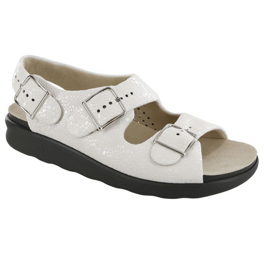 Allen's Bootery Relaxed vanilla leather sandals with adjustable silver buckles and a thick cushioned black sole.