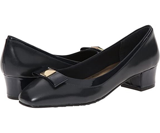 Allen's Bootery Santel navy cap toe pump with a low block heel and decorative gold-tone metal bow ornament