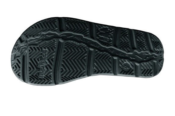 Black Allen's Bootery Stanley Slide sandal showing the textured, slip-resistant rubber outsole with arch support.