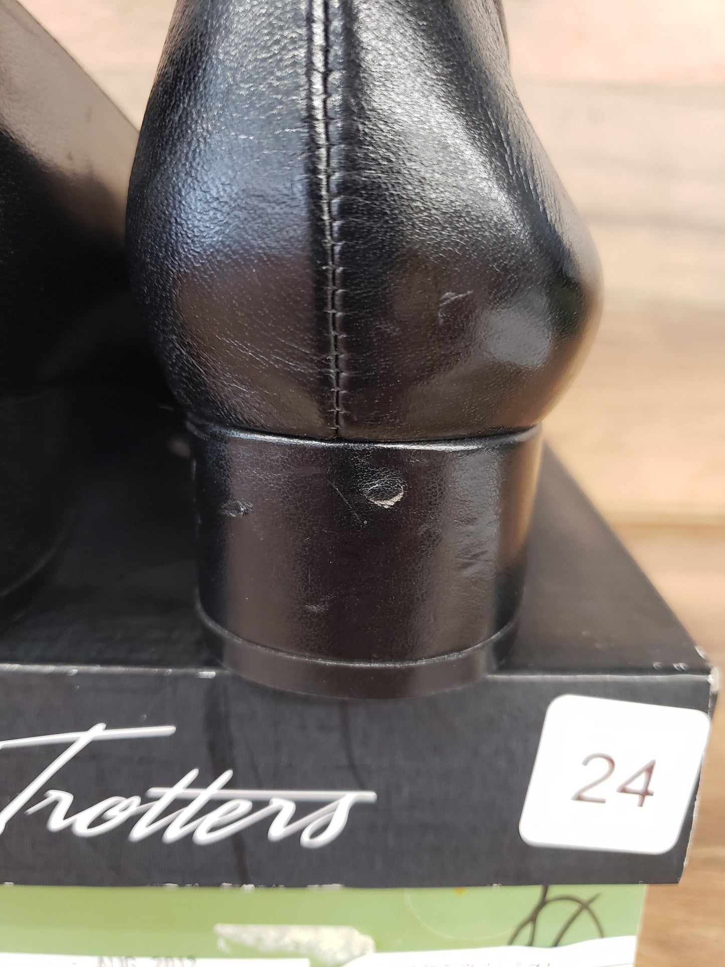 Allen's Bootery Trotters Doris black dress shoe heel showing minor surface blemish on the leather