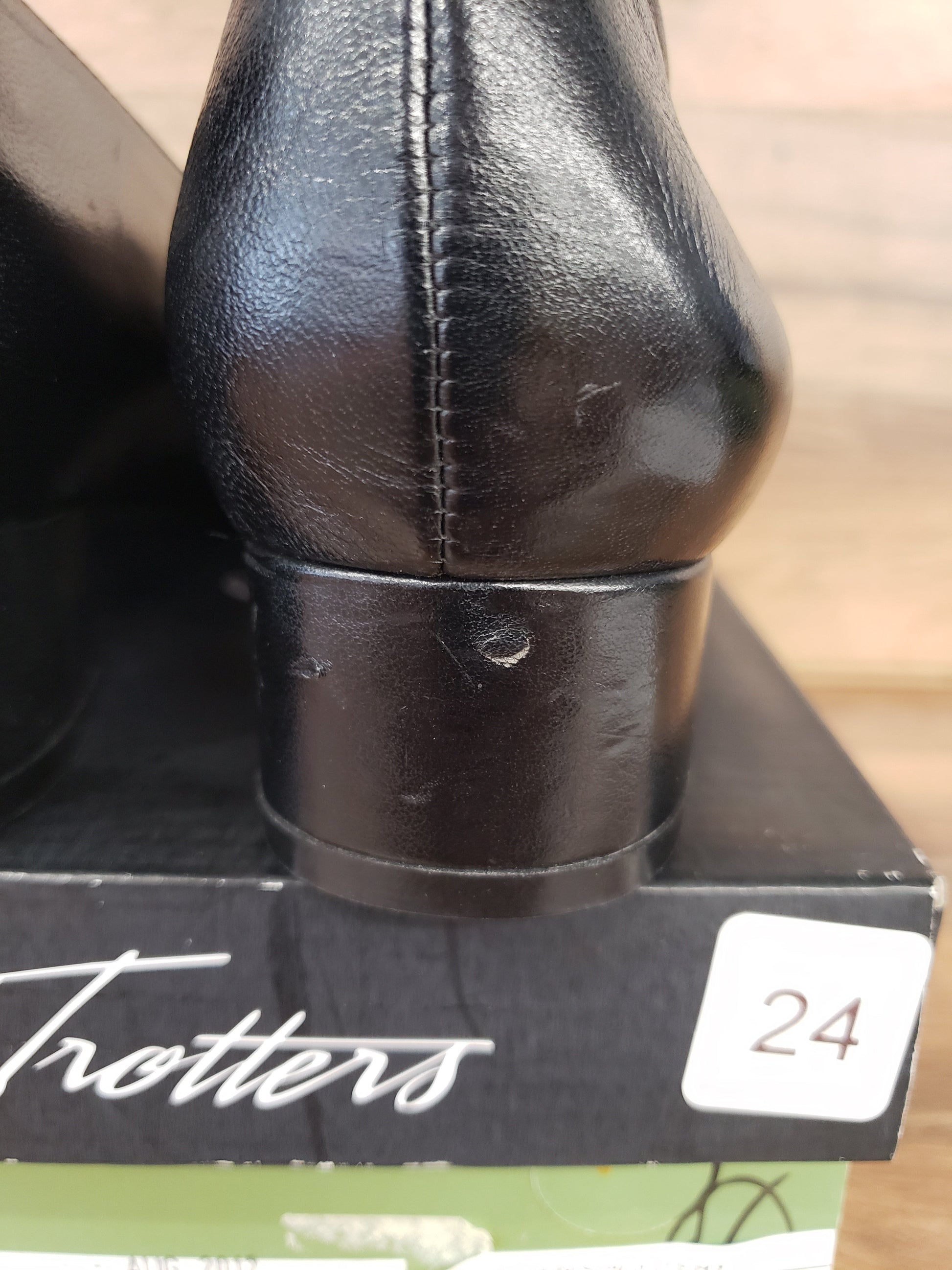Allen's Bootery Trotters Doris black dress shoe heel showing minor surface blemish on the leather