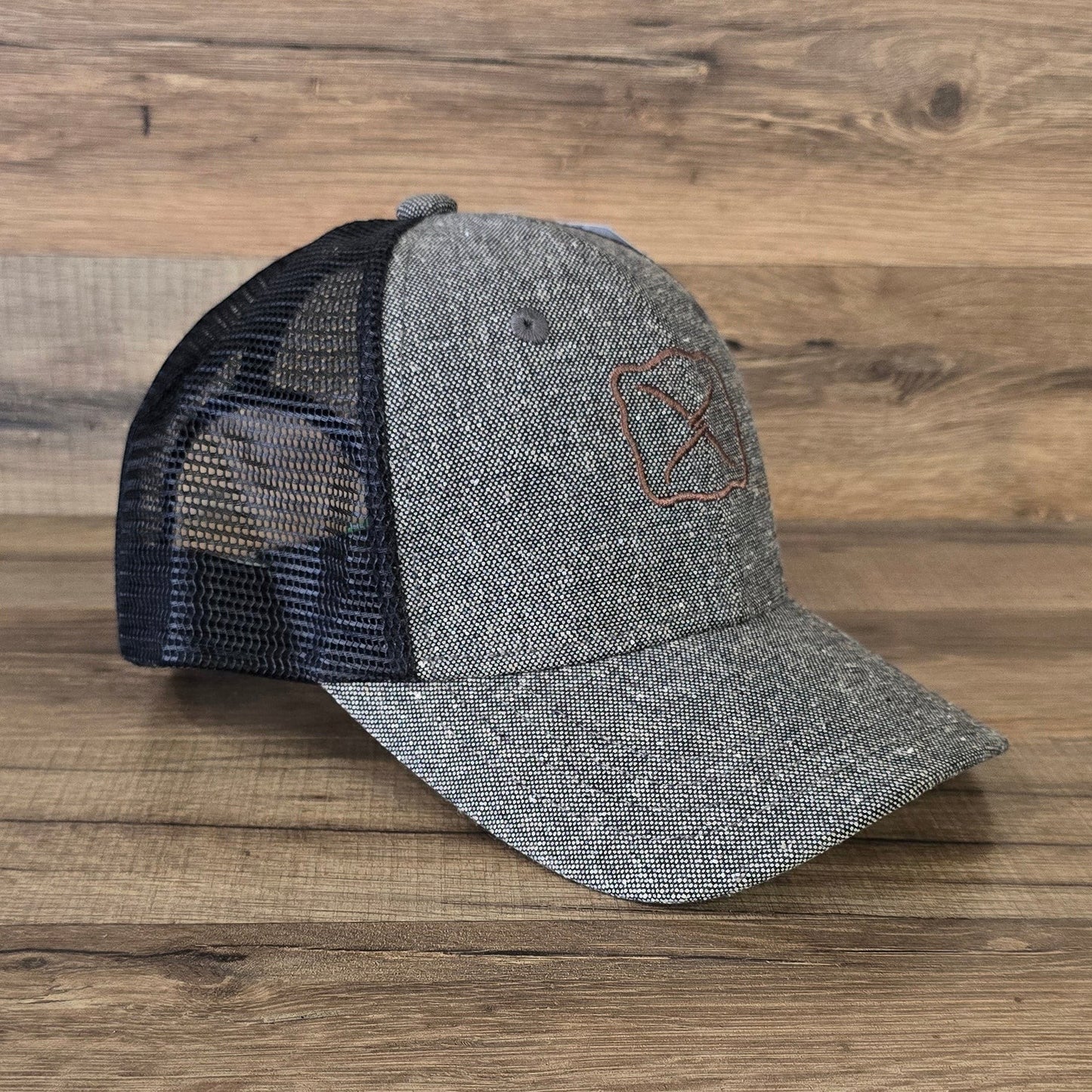 Allen's Bootery Twisted X trucker hat in charcoal tweed with a black mesh back and brown embroidered logo