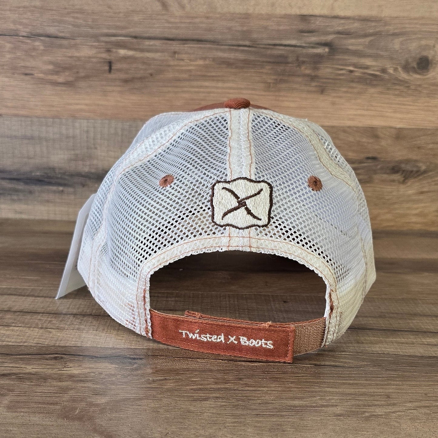 Allen's Bootery Twisted X trucker hat featuring a white mesh back, brown accents, and embroidered branding on the strap.