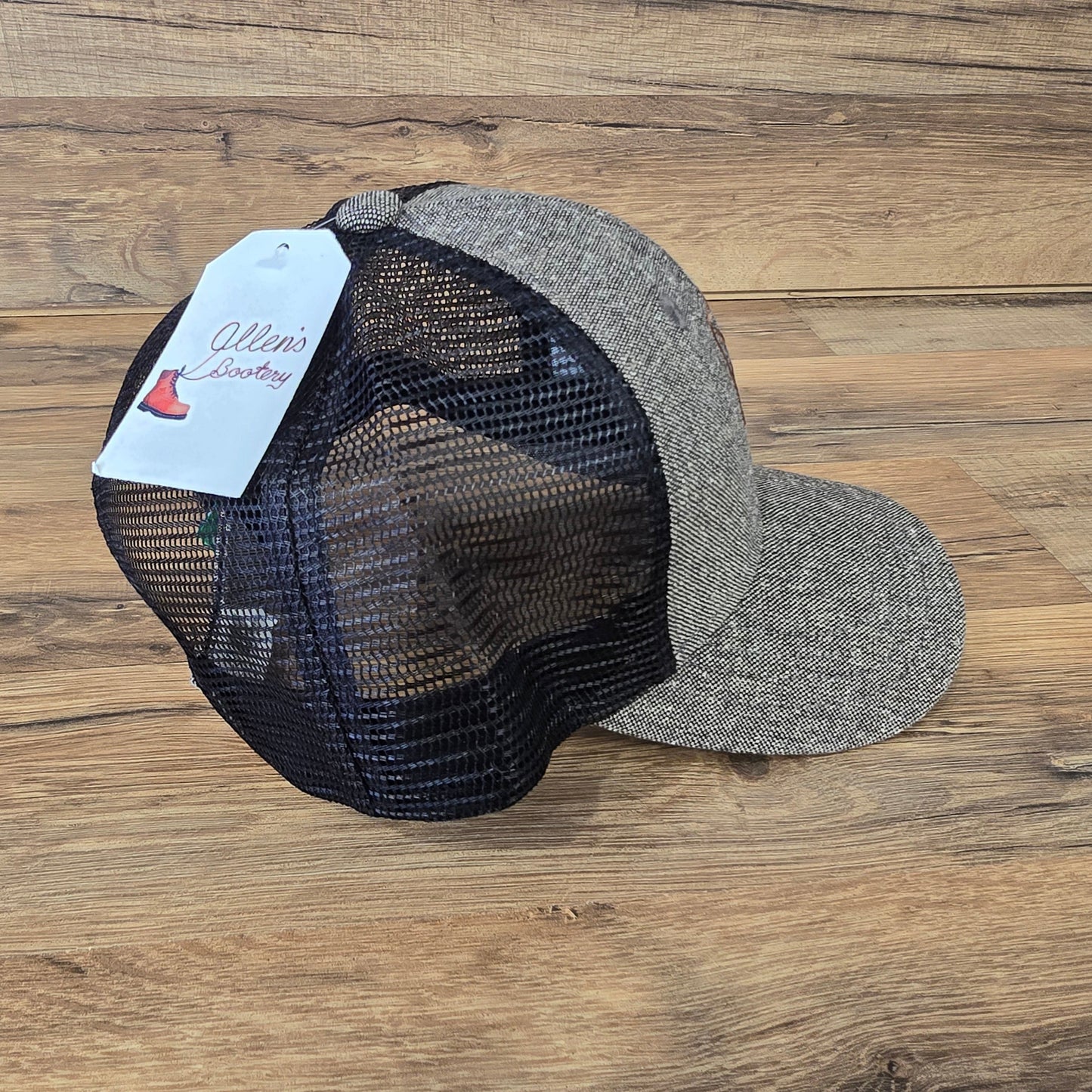Allen's Bootery Twisted X trucker hat in charcoal tweed with a black mesh back and hook and loop closure.