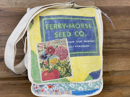 Allen's Bootery vintage-inspired canvas messenger bag with floral patchwork and seed company graphic print.