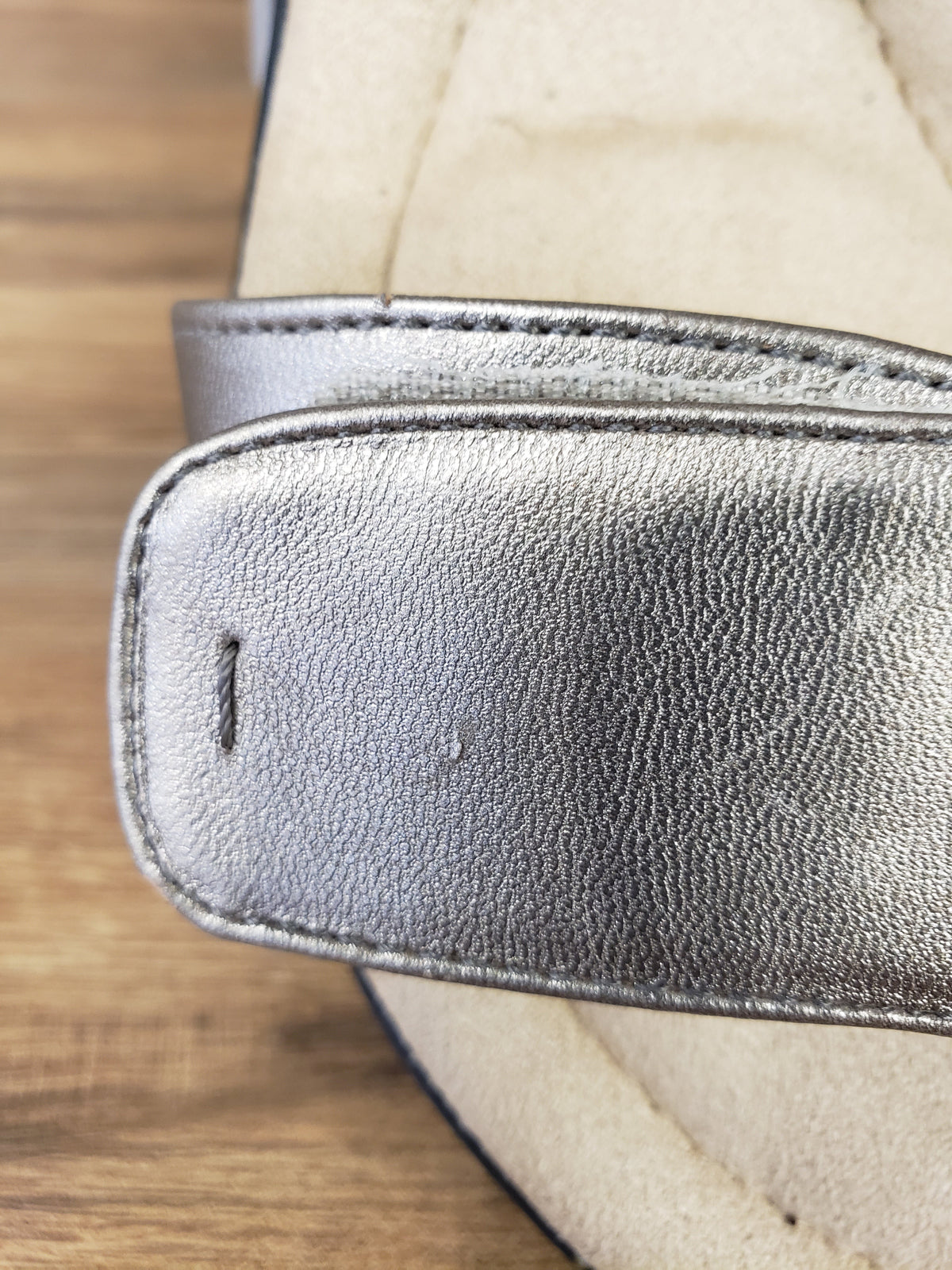 Allen's Bootery Wela pewter wedge sandal strap detail showing metallic textured finish and velcro closure