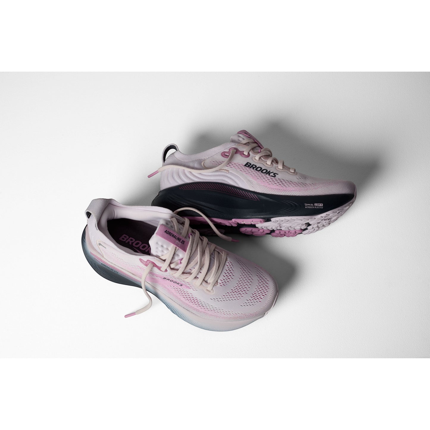 Allen's Bootery Women's Adrenaline 25 mauve and pink breathable mesh running shoes with dark navy accents and pink sole details.